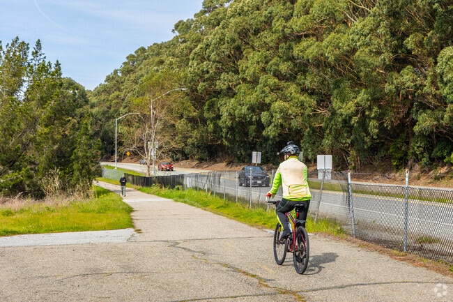 Downtown Millbrae bikers can enjoy the nearby Sawyer Camp Trail.