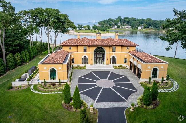 This Lloyd Harbor waterfront home overlooking Huntington Harbor is listed for $9.9 million.