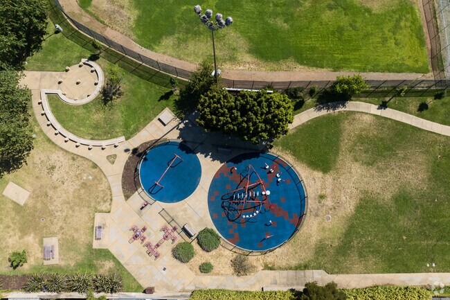 Carter-Gilmore near Coliseum features trails, play areas, and green space for all.