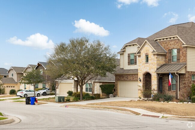 A row of newly developed national and tutor inspired homes in Schertz.