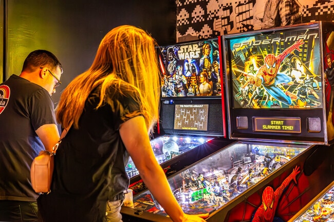 Locals who like a side of retro games with their drinks can stop by Up Down Arcade Bar.