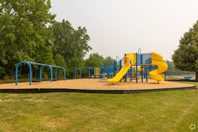 James H Watson Elementary School playground with slides and swings, Schererville, IN.