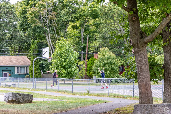 Kids enjoy playing basketball in Leland Park in Walnut Hill.