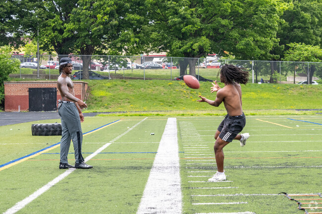 Play football with friends in Mondawmin.