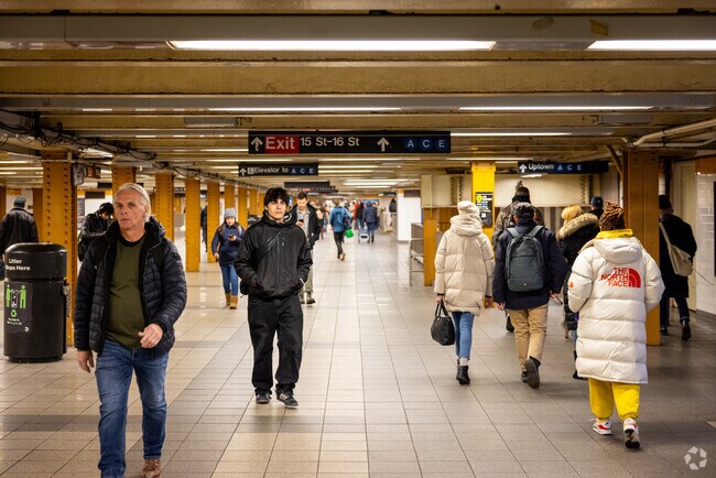 The A/C/E and L train subway on the corner of 14th Street and 8th Avenue.