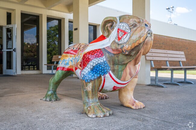 The YMCA bulldog mural stands at the front entrance of the building in Oglethorpe.