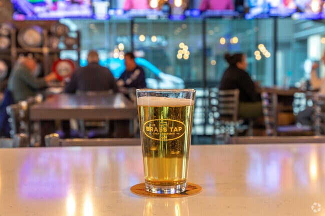 Head to The Brass Tap for happy hour beers and pub fare, near Sherrill Park.