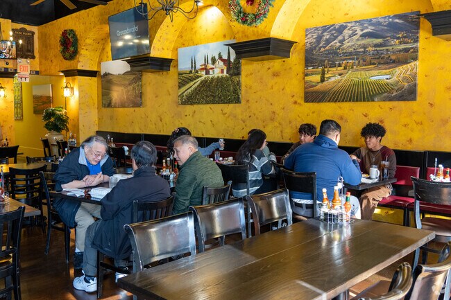 Village Grill offers comfort food near Murillo, perfect for casual dining.