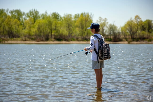 Arapaho Bend Natural Area is a popular fishing spot and serves as the habitat for over 80 bird species.