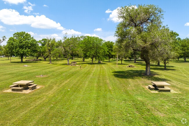 There are several picnic tables spread throughout the green space in Schweiter/Mead’s Linwood Park.