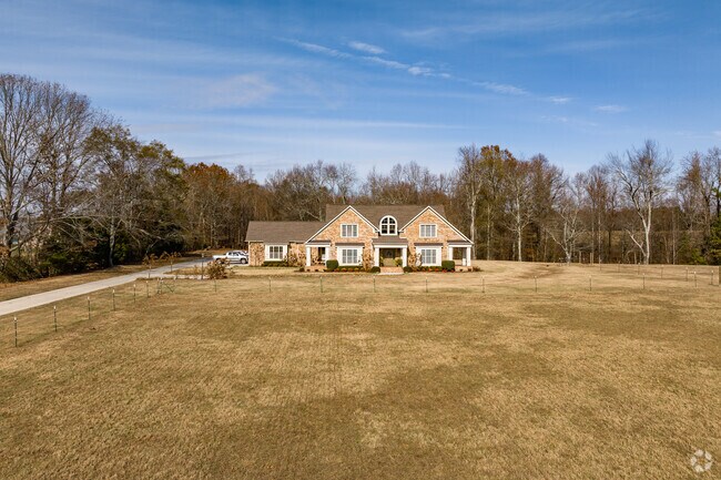 A beautiful large brick ranch home on a large plot in Elkmont.