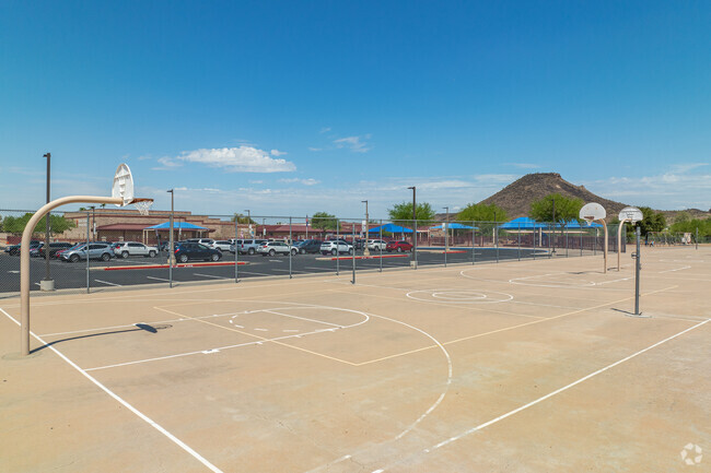 The students at Mountain Shadows Elementary School shoot some hoops.