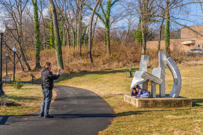 Artwork is admired by residents at the Reading Public Museum Arboretum.