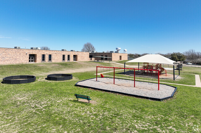 Students love playing on the playground at recess at Baxter Elementary School.