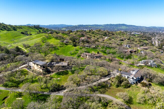 This spacious Brooktree North home sits on a large lot with stunning rolling hills as a backdrop.