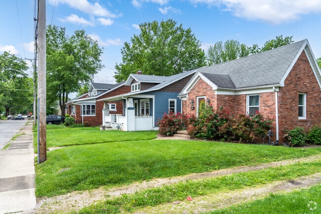 Single story brick cottage style homes sit alongside bungalows in University South.