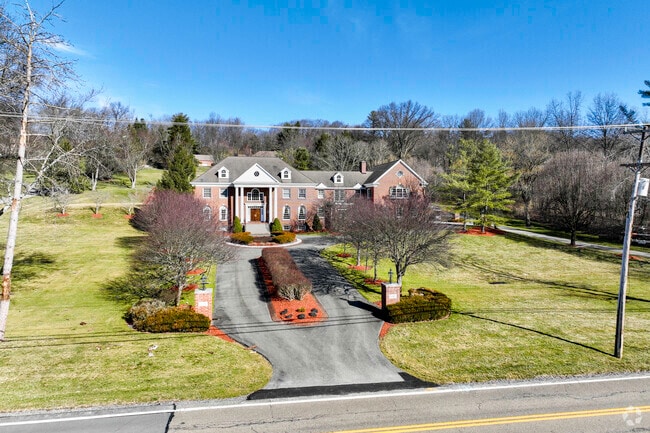 There are large custom built homes with driveways that can be seen throughout Fox Chapel.