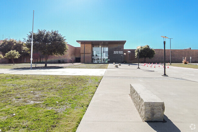 Students living in Arlington, TX may attend Workman Junior High School.