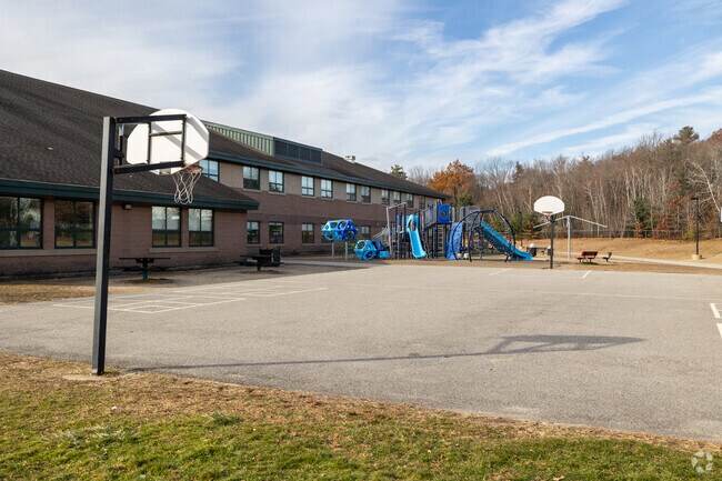 Play on the basketball court or playground during recess at the Tyngsboro Elementary School.