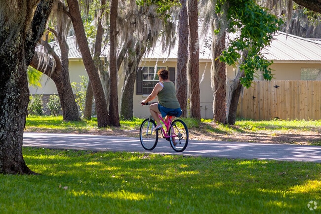 Ride around the quiet neighborhood streets shaded by lush oak trees in Sun Ridge in the City of Bartow Florida.