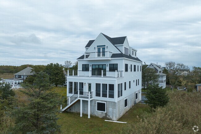 Large coastal contemporary-style homes with open floor plans can be found throughout Brant Rock.