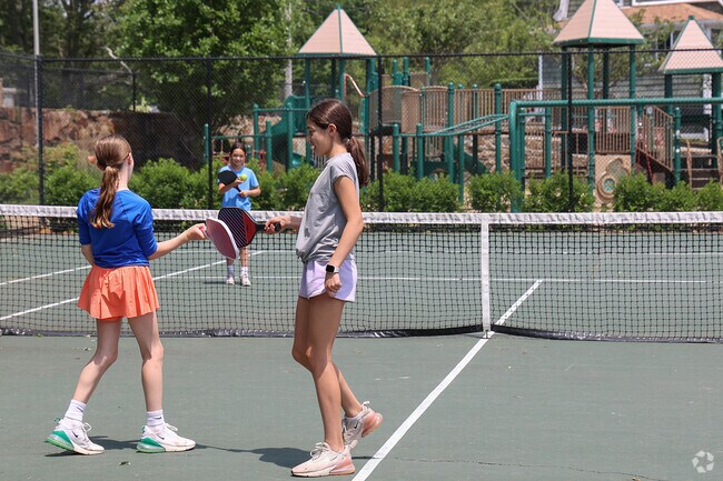 Dix Park's pickleball court is a favorite gathering spot for friends to play in the Beverly Farms neighborhood.