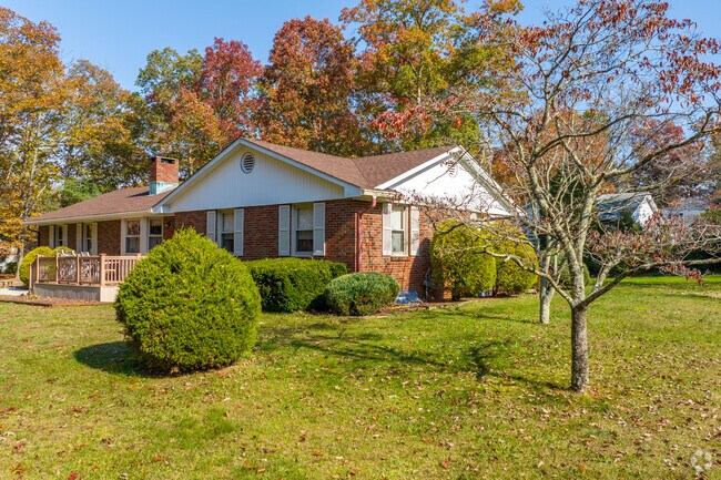 Single-story ranch-style homes in Newfield feature open living concepts and large front yards.