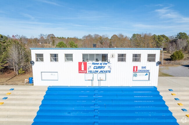 Watch a football game at Curry High School.