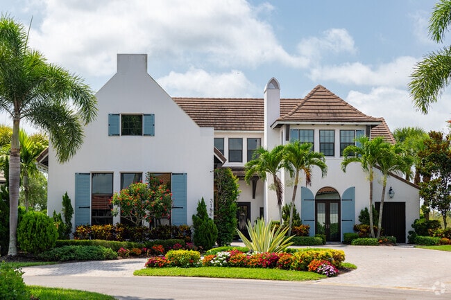 Fiddler’s Creek homes showcase vibrant architecture and tropical landscaping.