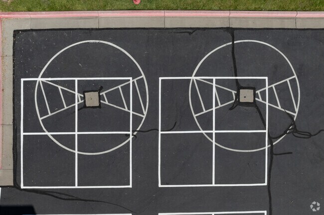 Activities are painted on the asphalt at Syracuse Arts Academy.