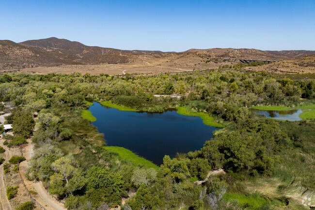 Small lake within the Mission Trails path accessible for fishing.