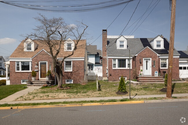 Cape Cod-style homes are common on residential streets in Bergenfield, NJ.