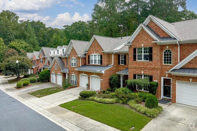 Updated townhomes with manicured lawns in Crabtree.