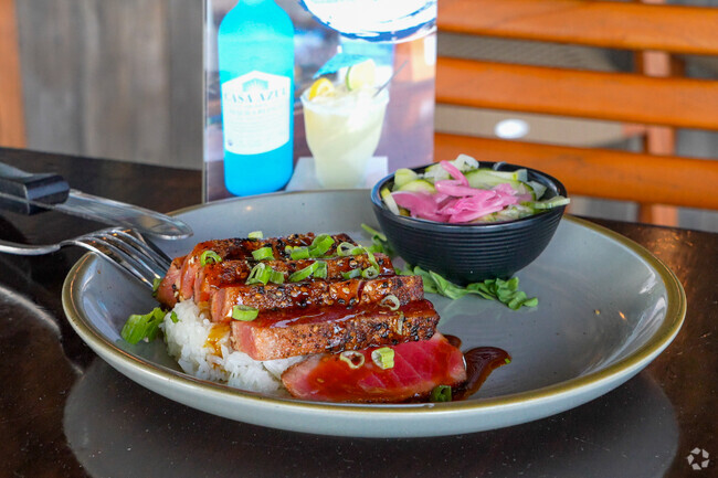 Residents of Pinedale Farms can explore fresh seafood dishes at Sloop John B.