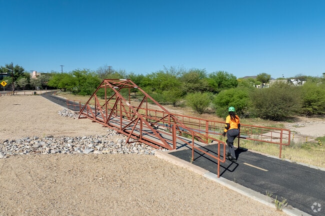 The Arroyo Chico Greenway has a paved trail that wraps around Barrio San Antonio.
