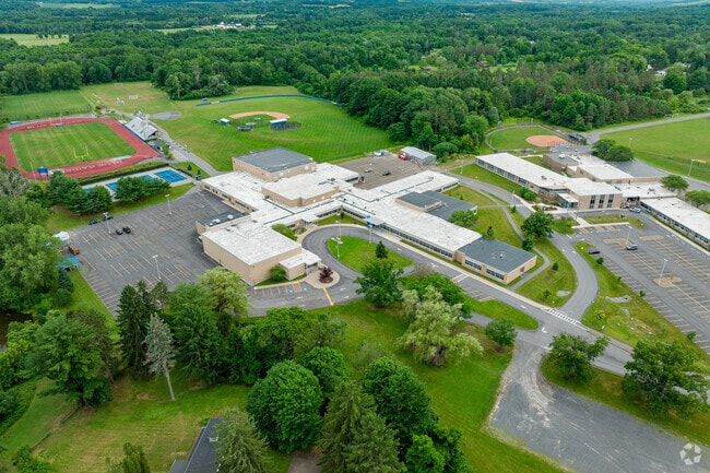 Charles O. Dickerson High School is rurally located and surrounded by forest.