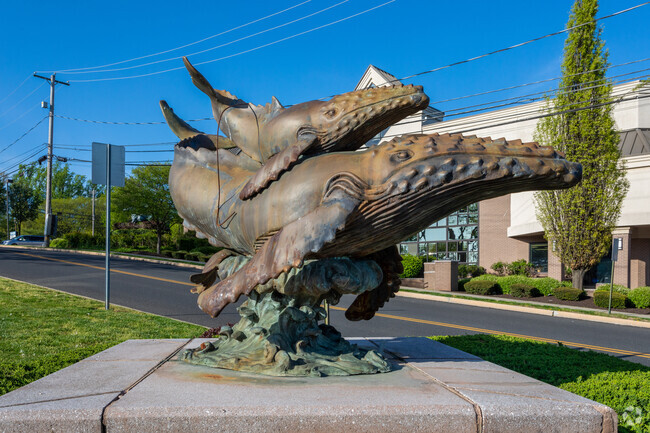 A whale statue greets residents to the Springfield Square shopping center in Morton.