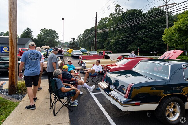 Darlington Township locals hang out with friends at the Greersburg Tavern Weekly Car Cruise.