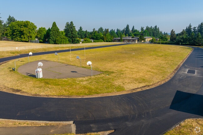 Track and basketball courts next to Hauton B Lee Middle School.