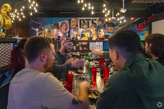 Mickeys Soju House serves global flavors and craft spirits in a lively evening setting.