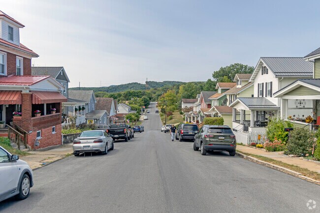 The Westfall community is best described by it's beautiful landscaping and towering hills.