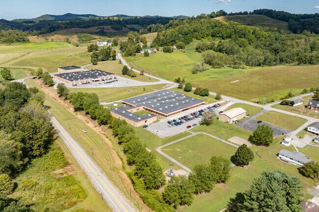 Teachers help students progress at Philippi Elementary School.