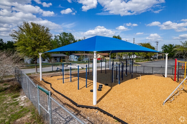 Kids enjoy climbing on the the monkey bars at Groveland Elementary School.
