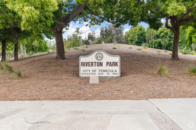 Riverton Park in Serena Hills offers a peaceful retreat with lush green spaces, playgrounds, and scenic walking paths, perfect for outdoor relaxation and family fun.