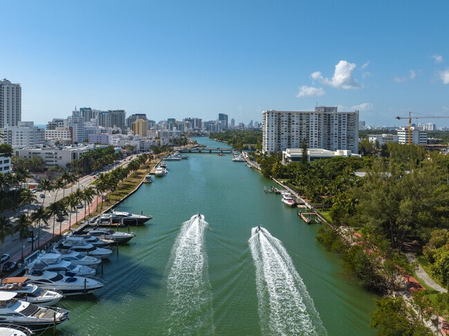 People con come jet skiing by the waterways to the Nautilus neighborhood.