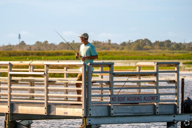 Mill Slough residents enjoy fishing piers on Lake Tohopekaliga for a peaceful day on the water.