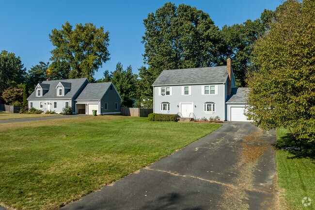 Contemporary Colonial homes with garages are popular in Hayden.