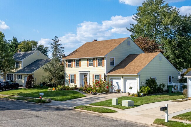 Traditional two-story homes with two-car garages in Evesham Township, NJ.