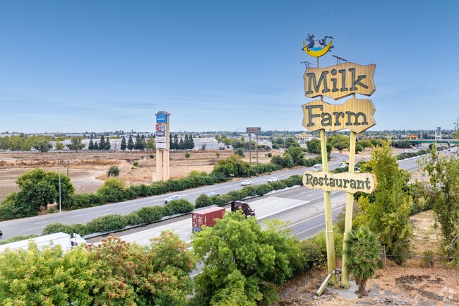 The Milk Farm monument sign welcomes visitors to Dixon.