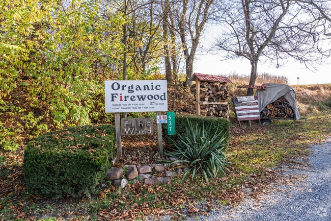 Cozy winter vibes: A stack of seasoned firewood ready to warm your home in Perry Township, PA.